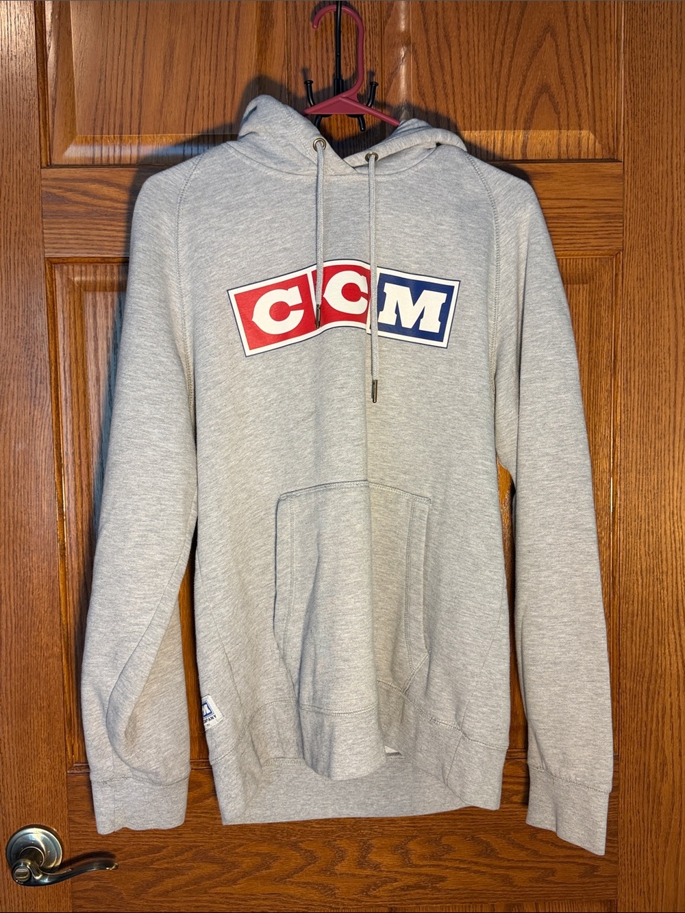 CCM Gray Pullover Hoodie with Red & Blue Logo